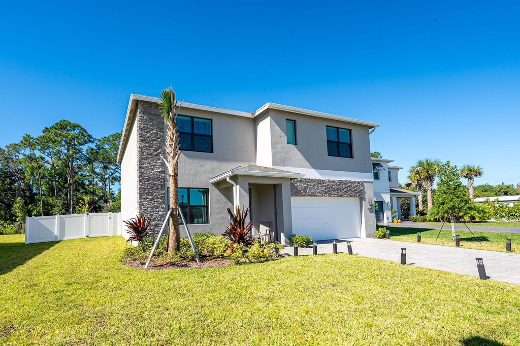 Photo of 6016 SE Se Violet Ln, Stuart, FL 34997 (MLS # R11136127)