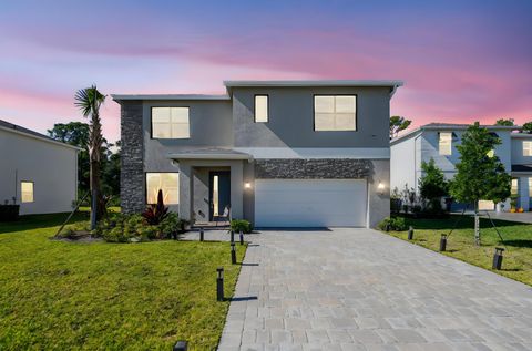 Photo of 6016 SE Se Violet Ln, Stuart, FL 34997 (MLS # R11136127)