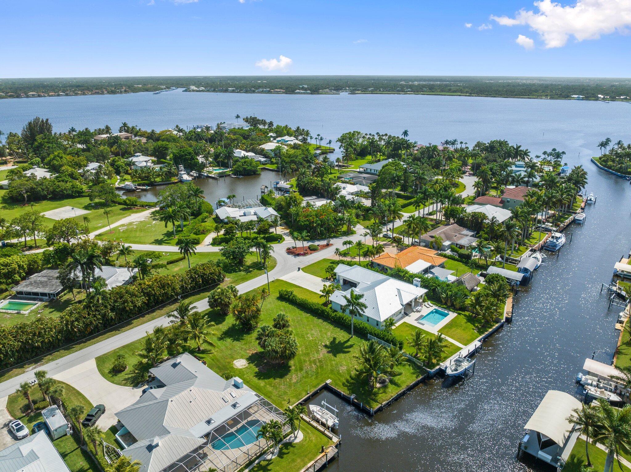Calling all boaters! One of the last waterfront lots available in North River Shores. This prime, cleared, and filled lot is ready for your custom dream home. With nearly half an acre and 100 feet of frontage on a wide canal, there's ample space for a large vessel, and no fixed bridges mean direct access to open water. Unique double cut-out design allows for additional docking of jet skis, dinghies, or a second boat. A spacious turning basin nearby makes maneuvering larger boats a breeze. North River Shores is a well-established, non-HOA boating community with 3 waterfront parks and boat slip just steps away & conveniently located near shopping, dining, Downtown Stuart, beaches, and top-rated schools.