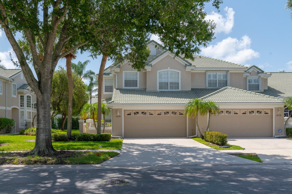 Photo of 1676 SW Harbour Isles Circle #97, Port Saint Lucie, FL 34986 (MLS # B26071593)