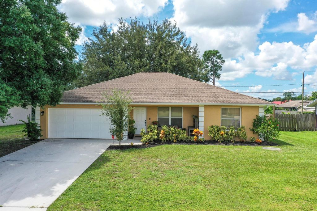 Photo of 1114 SW Coleman Avenue, Port St Lucie, FL 34953 (MLS # R10910094)