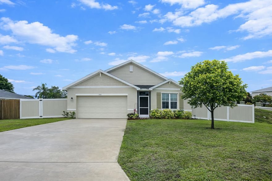 Experience the perfect blend of style and functionality in this newer 4-bedroom, 2-bath home with a 2-car garage and sought-after split floor plan. Designed for modern living, the open-concept layout showcases a spacious kitchen featuring a large island bar, walk-in pantry, and recessed lighting that flows seamlessly into the dining and living areas. Beautiful ceramic tile runs throughout the main spaces, with comfortable carpet in the bedrooms. The oversized primary suite offers a true retreat with a generous walk-in closet. Step outside to your screened-in lanai and enjoy a fully fenced backyard with privacy fencing ideal for relaxing or entertaining. This home truly stands out! Photos may include virtual staging for illustrative purposes only. Actually Furnishings & conditions may vary. Energy-efficient home with Energy Star-compliant features. Systems are currently not active, and the seller's existing service agreement is non-transferable. Buyer may elect to activate services independently to restore full Energy Star functionality.