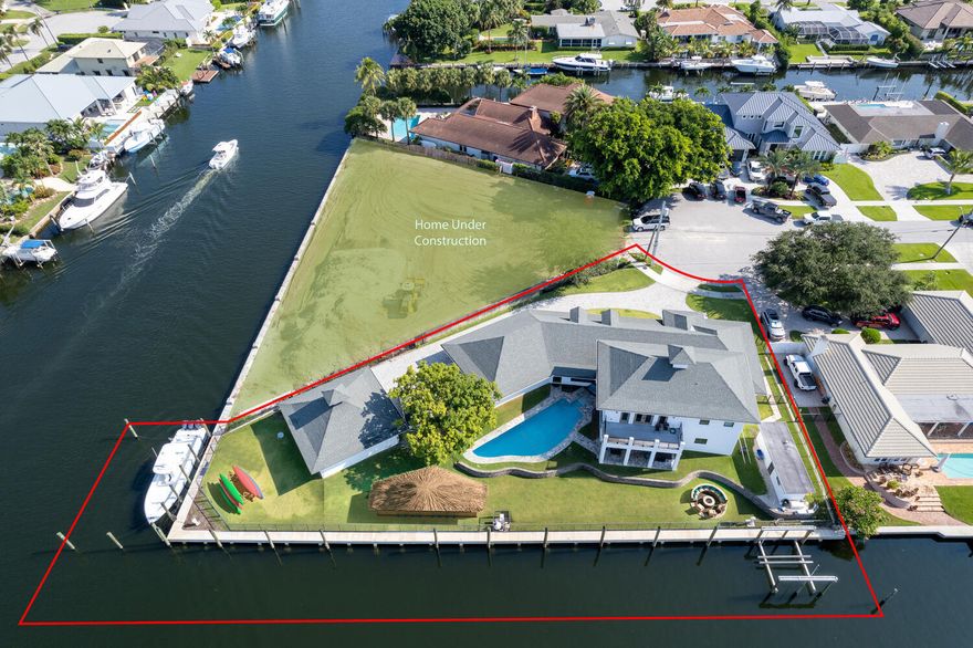 Don't miss your chance to own this completely renovated,  gorgeous waterfront home in the Village of North Palm Beach located on a deep water canal. Completely renovated in 2015. 2nd floor added in 2015. 6 bedroom, 5.1 baths. Total Sq. Ft. 6,952. Living Sq. F.t  5,070. Lot measures 189 x 110 x 209 x 40. Located at the end of a cul-de-sac.  250 feet of waterfrontage. 
24,000 lb boat lift. No fixed bridges.
 Electrical is 350 amps going to the dock and 3 power pedestals. 3 phase electric available at dock. New seawall cap and pilings. CBS construction.
 Impact windows.  3 car garage. Wood and marble floors throughout.  Recessed lighting throughout. Pool, and canal view from almost every room. 
 Gourmet kitchen with oversized island, wood cabinetry with glass door accents, gas stove with vented hood, wall oven wall microwave and desk area.  Bright breakfast nook area, Family room has sliders and French doors leading to the pool, yard and dock area. 2nd floor master bedroom has 2 oversized walk in closets, French doors and sliders leading to the private balcony with sweeping  water views. 
Master bath has his and hers vanities, soaking tub, separate walk in shower, and room for seating.  5 bedrooms on the 1st floor.   Covered lanai with South exposure. Pool with brick paver deck and cabana bath. Laundry room with storage cabinets, countertops and utility sink. 
The Village of North Palm Beach  features several beautiful parks, such as Anchorage Park, with playgrounds, docks, volleyball courts, tennis courts, and a dog park. The Village is also home for the newly renovated  North Palm Beach Country Club, featuring an Olympic swimming pool, splash pad, picnic area, an on-deck tiki hut,  200 seat banquet room, 100 seat Farmer's Table restaurant,  A Jack Nicklaus Signature Golf Course, and a full featured Tennis Facility with Har-Tru courts. Close to beaches, recreation, dining and entertainment. Easy access to major highways and Palm Beach International Airport. AVAILABLE FOR LEASE AT $20,000 PER MONTH