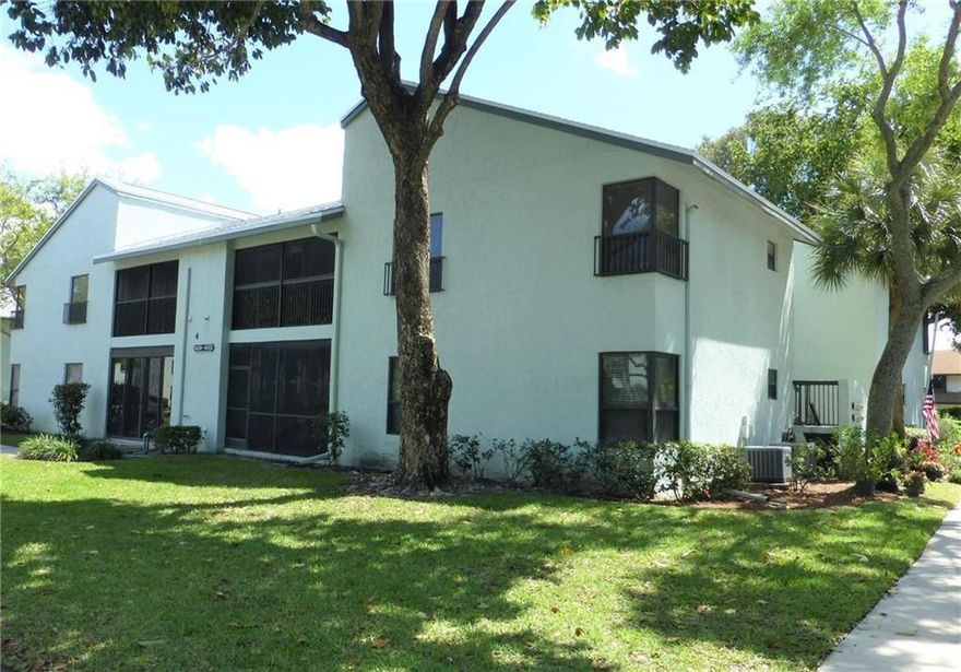 Curb appeal!  Beautifully appointed 2 bedroom 2 bath condo with travertine floors laid diagonally, impact windows everywhere except patio flex space that can serve as an office or den, split floor plan, updated kitchen with plenty of pull-out storage and widened entry, same beautiful granite in kitchen and baths, undermount sinks.  Kitchen appliances 2 years old, washer/dryer 1 year old. Large master bedroom has walk in closet.  All ages, access to all of the amenities of the Township, including state-of-the-art gym, theater, tennis and pickleball, basketball, and resort-style pool.  20 minutes to Pompano Beach.