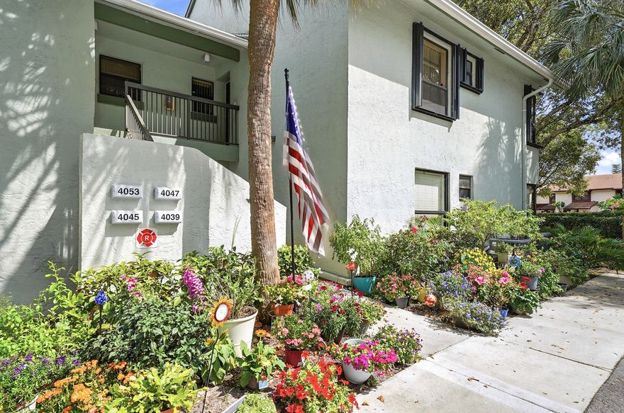 Curb appeal!  Beautifully appointed 2 bedroom 2 bath condo with travertine floors laid diagonally, impact windows everywhere except patio flex space that can serve as an office or den, split floor plan, updated kitchen with plenty of pull-out storage and widened entry, same beautiful granite in kitchen and baths, undermount sinks.  Kitchen appliances 2 years old, washer/dryer 1 year old. Large master bedroom has walk in closet.  All ages, access to all of the amenities of the Township, including state-of-the-art gym, theater, tennis and pickleball, basketball, and resort-style pool.  20 minutes to Pompano Beach.