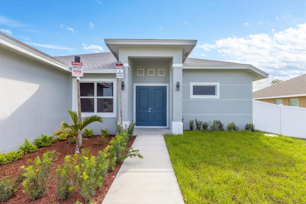 Photo of 3866 SW Laidlow Street, Port Saint Lucie, FL 34953 (MLS # R11062818)