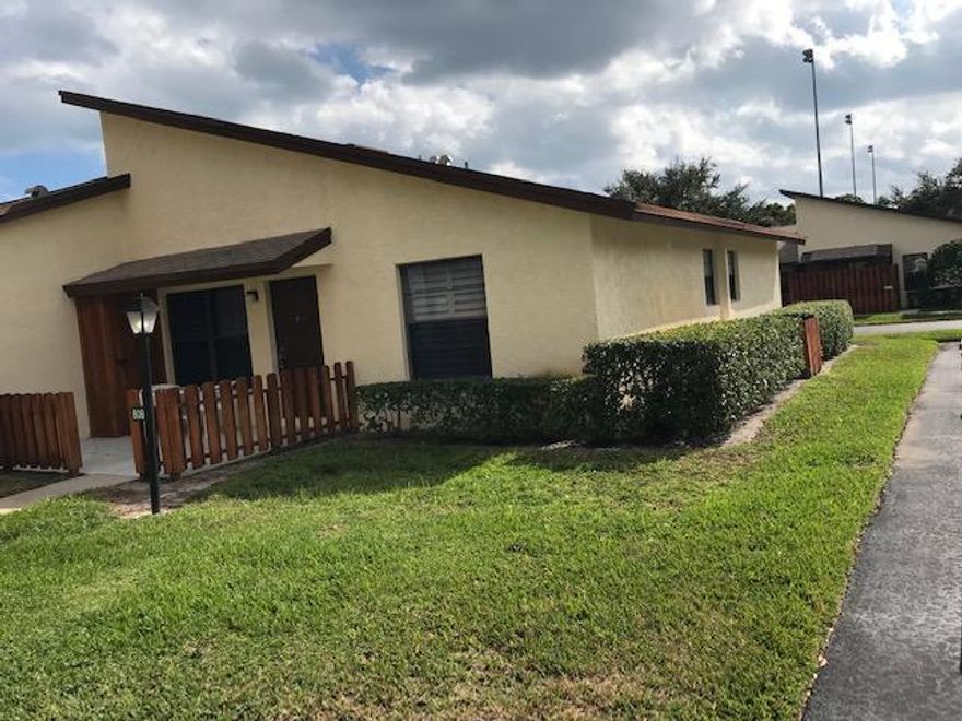 Located in the heart of Hobe Sound this lovely 55+ community offers a small community atmosphere.  Unit is single story 2 car parking right outside door. Spacious interior with large living / dining room, eat in kitchen, covered patio, 2 bedrooms, 2 full baths and in unit laundry.  Unit being sold completely furnished.