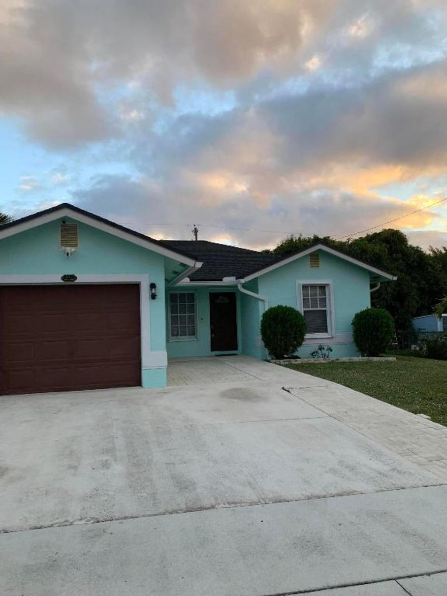 Step into luxury with this stunningly remodeled 3-bedroom, 2-bath single-family home! This isn't just a rental; it's a masterclass in modern design. Every inch has been upgraded to perfection, featuring sleek wood flooring, designer fixtures, and elegant 8-inch baseboards that scream sophistication.

The heart of the home is a brand-new chef's kitchen boasting premium stainless steel appliances and chic finishes. With fresh paint inside and out, the home feels bright, airy, and move-in ready.

But the real magic happens outside! Retreat to a massive, private backyard—a true paradise. Forget the grocery store; enjoy your own tropical harvest with fresh Ackee, Papaya, Mangoes, Coconuts, Plums, Pineapples, and Lemon Grass right off the tree.

Don't wait—this gem won't last!
