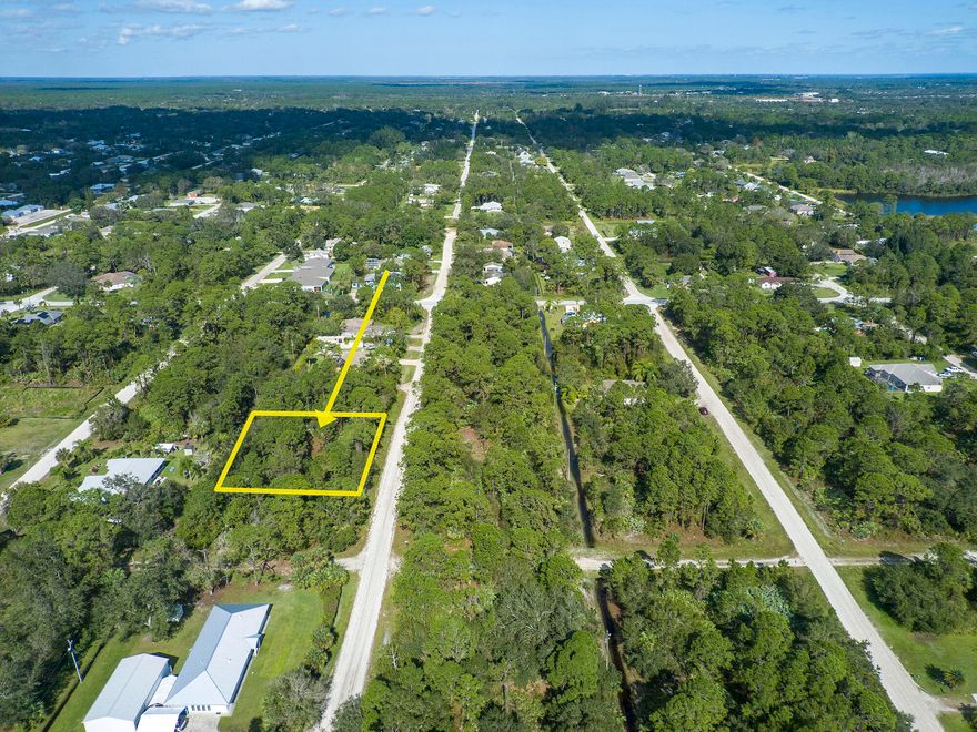 Very nice sized lot located in VLE. Build your dream home on almost half an acre in the Southern side of Vero Lake Estates. Enjoy space to spread out & not feel like you are right on top of your neighbor, all while remaining within 15 minutes of shopping, dining, parks & more! Utility poles located at rear of property. Aerial boundary lines are approx, buyer to verify. Call today!