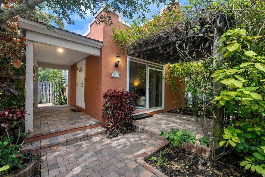 ***Rarely Available*** Escape to this charming villa nestled in a prime location of Old Progresso Village, the hotspot of Ft Lauderdale. Walking/Biking distance to Fort Lauderdale beach, FAT Village, The Wharf, Las Olas, Sistrunk Marketplace, the Brightline, + all the shopping & fine dining Ft. Lauderdale has to offer..  Gorgeous mature trees shade the spacious backyard making the perfect space for entertaining.  Fully fenced with enough room for the dogs to roam. Lush landscaping throughout the entire property.  Plenty of parking with this large corner lot + massive pavered driveway. Upgraded kitchen with stainless steel appliances, quartz counters, & dark wood cabinetry complement this open concept layout perfectly.  Full size washer & dryer!!