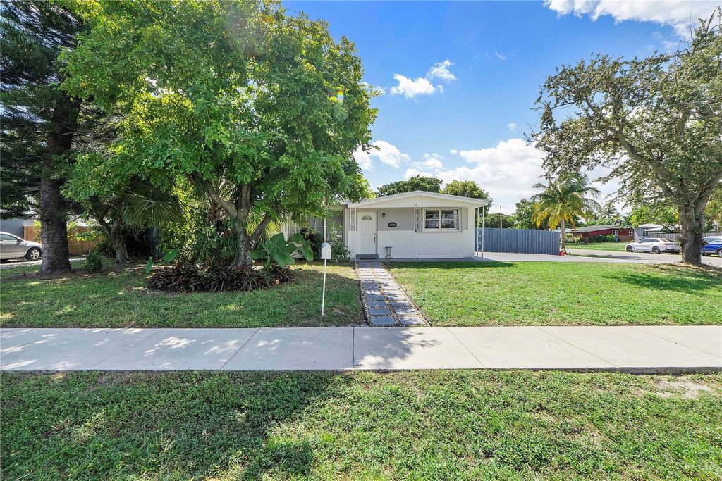 Photo of 1130 NW 42nd Ct, Oakland Park, FL 33309 (MLS # F10532834)