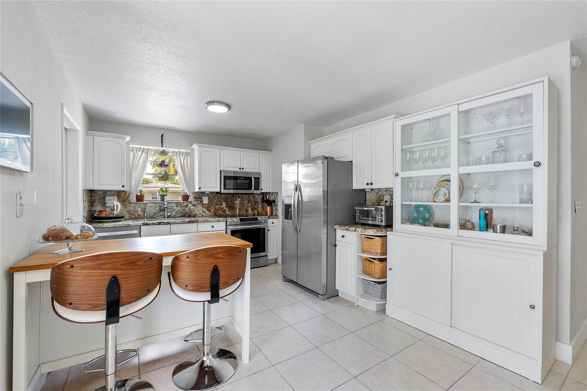 View photos, virtual tours, details... 1130 NW 42nd Ct