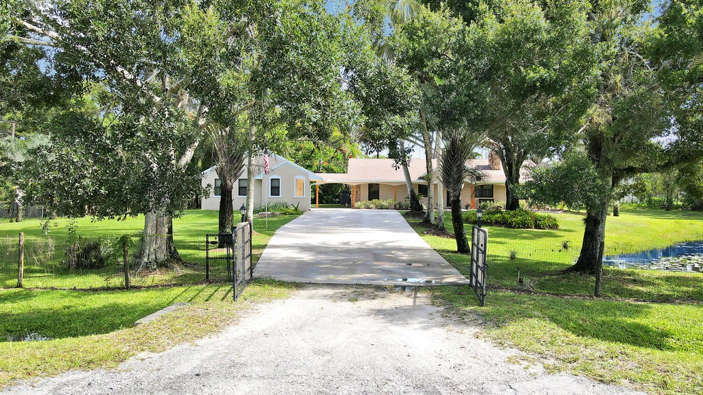 Photo of 12734 66th Street N, West Palm Beach, FL 33412 (MLS # R11114605)