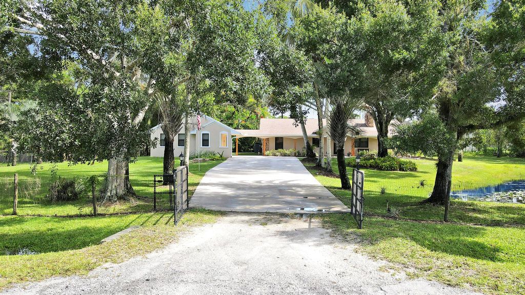 Photo of 12734 66th Street N, West Palm Beach, FL 33412 (MLS # R11114605)
