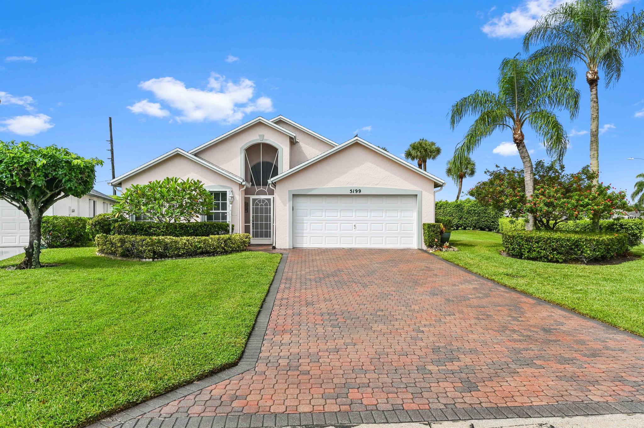 Discover this charming 1-story home located in the desirable gated 55+ community of Cypress Lakes. Featuring 2 bedrooms, 2 bathrooms, and 1,836 sq ft of living space, this residence offers comfort and convenience. Highlights include a 2-car garage, accordion shutters on all windows, and electronic roll-up shutters in the 2nd bedroom and patio for added protection. Inside, you'll find a welcoming foyer, a spacious living and family area, tile flooring throughout, and a kitchen with appliances, a storage cabinet, and hi-hat light fixtures with fan rheostats.The home also offers a screened porch, a laundry room with washer and dryer, and a backyard.