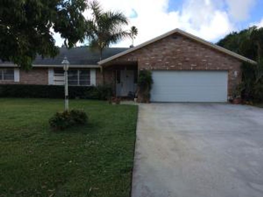 Come home to this wonderful 3 bedroom pool home featuring cabana bath, fireplace, well water and sewer, outdoor shower, shed, stand by generator, mango, orange, lychee and avocado trees.  All bedrooms have walk in closets and both bathrooms lead to pool.  Kitchen also has pass thru to pool area.  Roomy 2 car garage with automatic garage opener.  You will love this homes spacious layout.  Covered patio for grilling and enjoying the winter months we all adore.