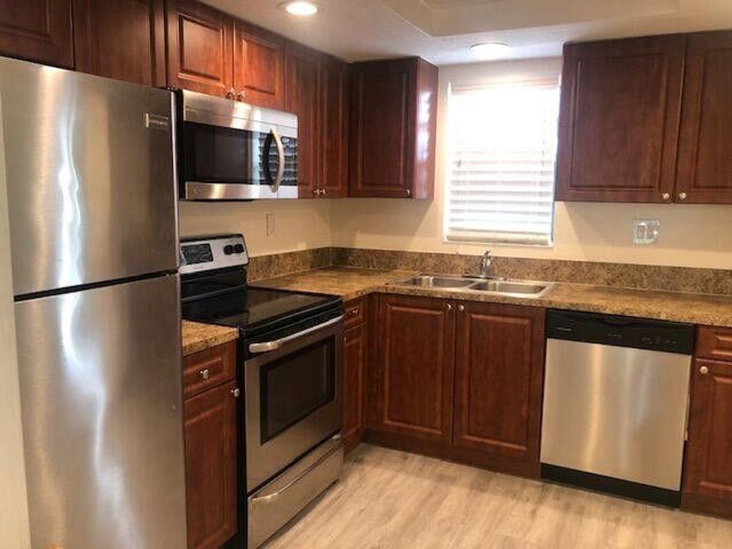 Photo of 9235 SW 8th Street #403, Boca Raton, FL 33428 (MLS # R11161478)