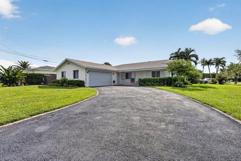 Photo of 617 Heron Drive, Delray Beach, FL 33444 (MLS # B26074840)