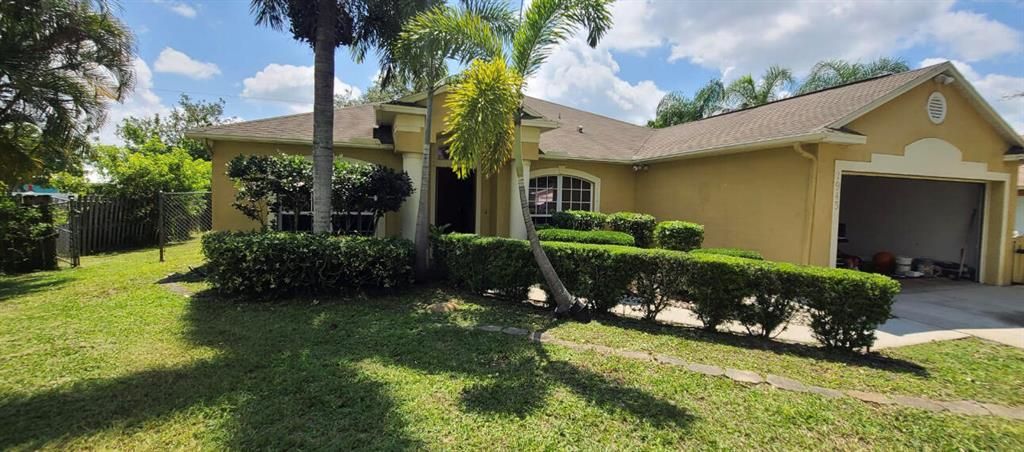 Photo of 1943 SW Capeador Street, Port St Lucie, FL 34953 (MLS # R10900046)