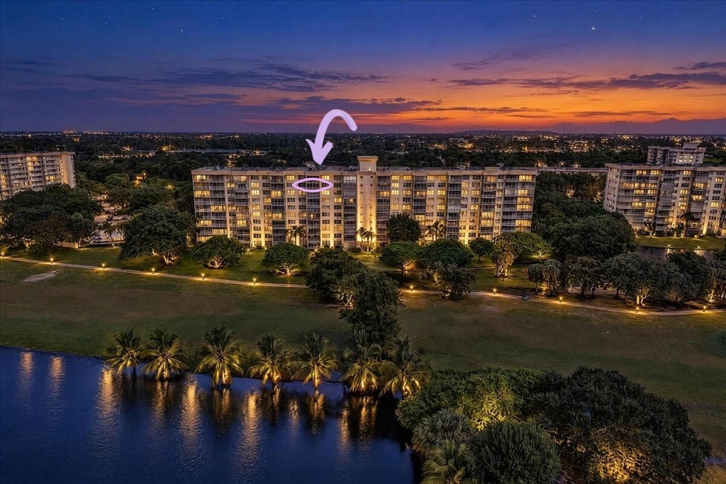 Photo of 3520 Oaks Way #904, Pompano Beach, FL 33069 (MLS # B26084705)