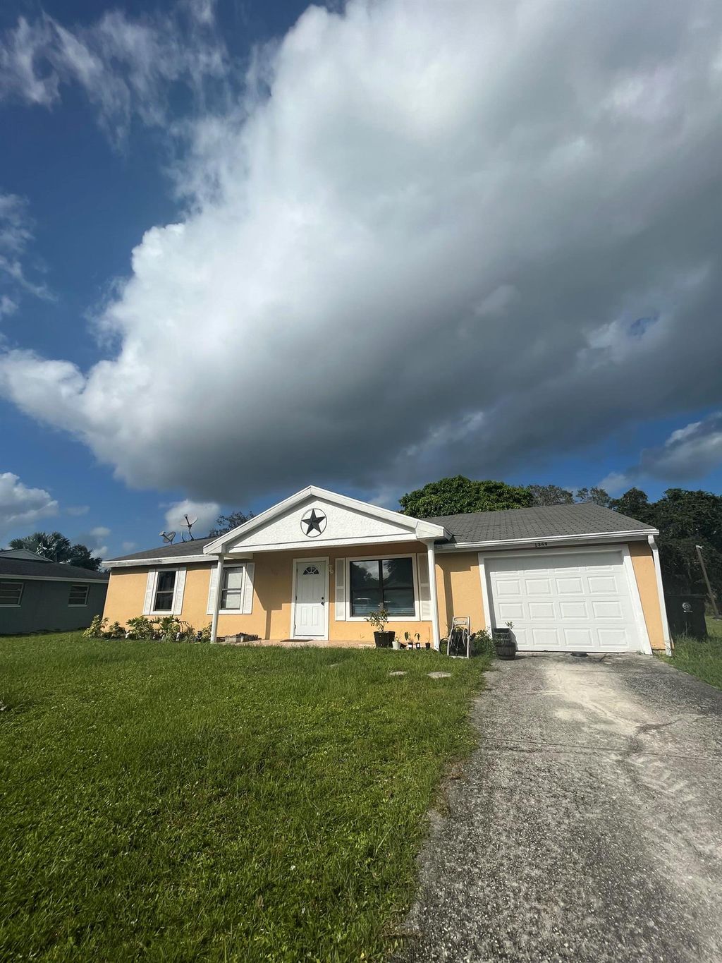 Photo of 1349 SE Roanoke Street, Port St Lucie, FL 34952 (MLS # R10916567)
