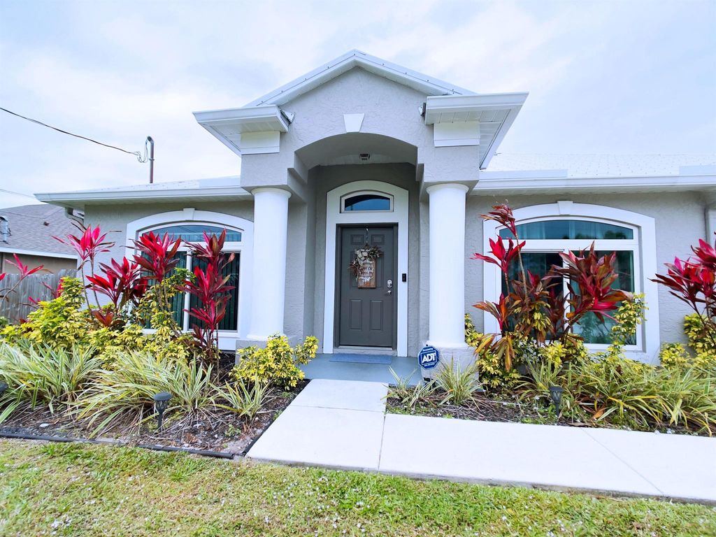Photo of 5787 NW Culebra Avenue, Port St Lucie, FL 34986 (MLS # R10863643)