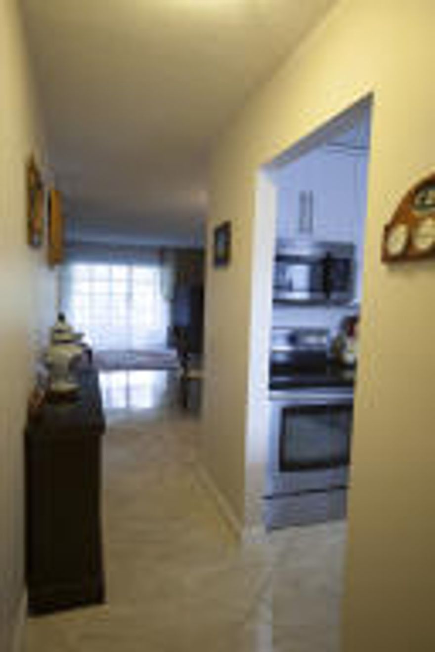 FULLY REMODELED 2 BEDROOM 2 BATH, NEW KITCHEN WITH SOPHISTICATED APPLIANCES INCLUDING A WASHER, UPDATED BATHROOMS, NEW LIGHT FIXTURES, TILE THROUGHOUT. LOTS OF CLOSET SPACE, PATIO OVERLOOKING BEAUTIFUL GARDEN VIEW BARBEQUE.  THIS DEVELOPMENT OF OXFORD HAS ITS OWN POOL, LAUNDRY AND PATIO WITH BBQ FOR RESIDENTS OF OXFORD ONLY.  ENTERTAINMENT CENTER, TWO CHAIRS IN LIVING ROOM AND ALL PAINTINGS WILL NOT CONVEY WITH PROPERTY.  OTHER FURNITURE IS NEG.