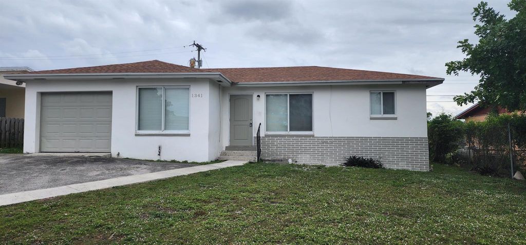 Photo of 1341 W 31st Street, Riviera Beach, FL 33404 (MLS # R10948323)