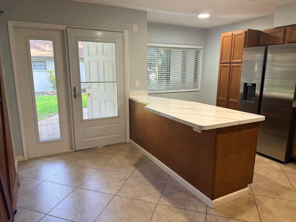 Photo of 4075 N Palm Forest Dr Drive N, Delray Beach, FL 33445 (MLS # B26035417)
