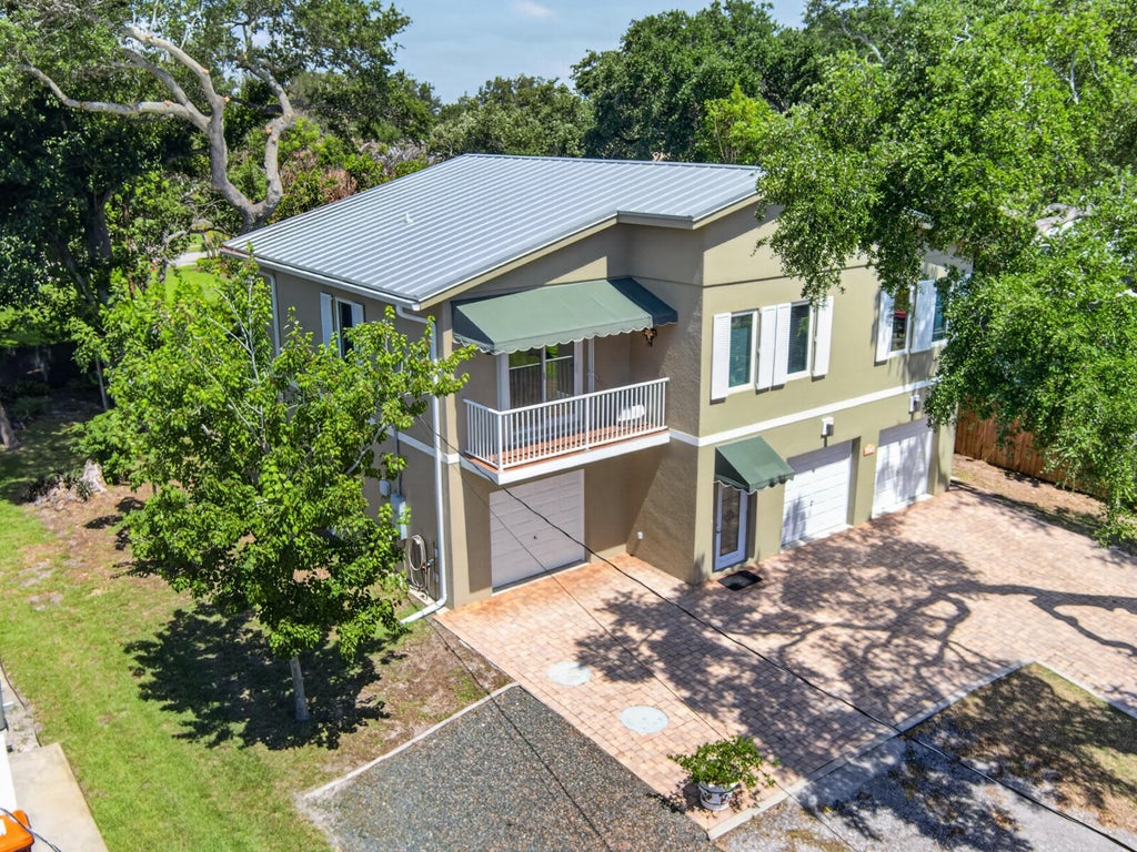 Photo of 9435 Frangipani Drive, Vero Beach, FL 32963 (MLS # B26041281)