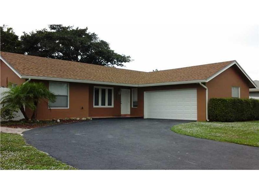 Another Professionally Managed Property located in Boca Raton, FL!   Spacious single family home, split bedoom floorplan, wall to wall tiles, Fully upgraded kitchen with granite tops and stainless steel appliances, Bathrooms also fully remodeled with flo ating glass enclosures, Large master bedroom with built in closets, home is fenced in - great for entertaining.  A must see!