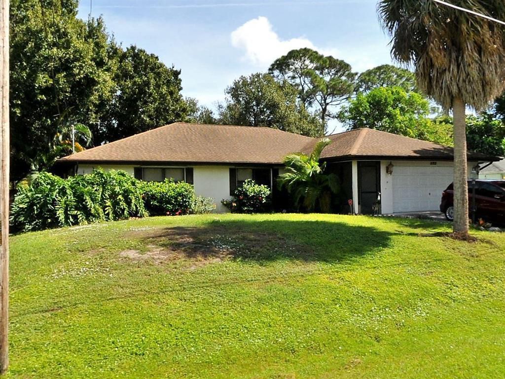 Photo of 5112 Myrtle Drive Dr, Fort Pierce, FL 34982 (MLS # R10822351)