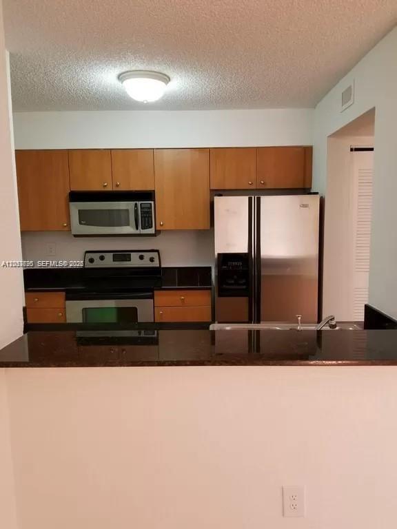 Photo of 2890 N Oakland Forest Drive #111, Oakland Park, FL 33309 (MLS # A12033695)