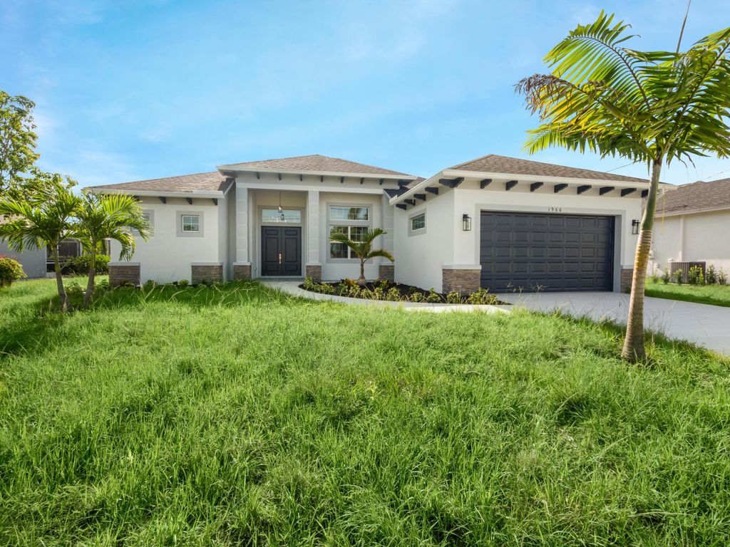 Photo of 1966 SE Gaskins Circle Cir, Port St Lucie, FL 34952 (MLS # R10805211)