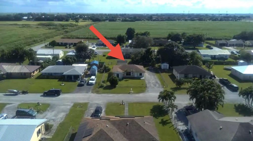 Photo of 832 SW Avenue I, Belle Glade, FL 33430 (MLS # R11134012)