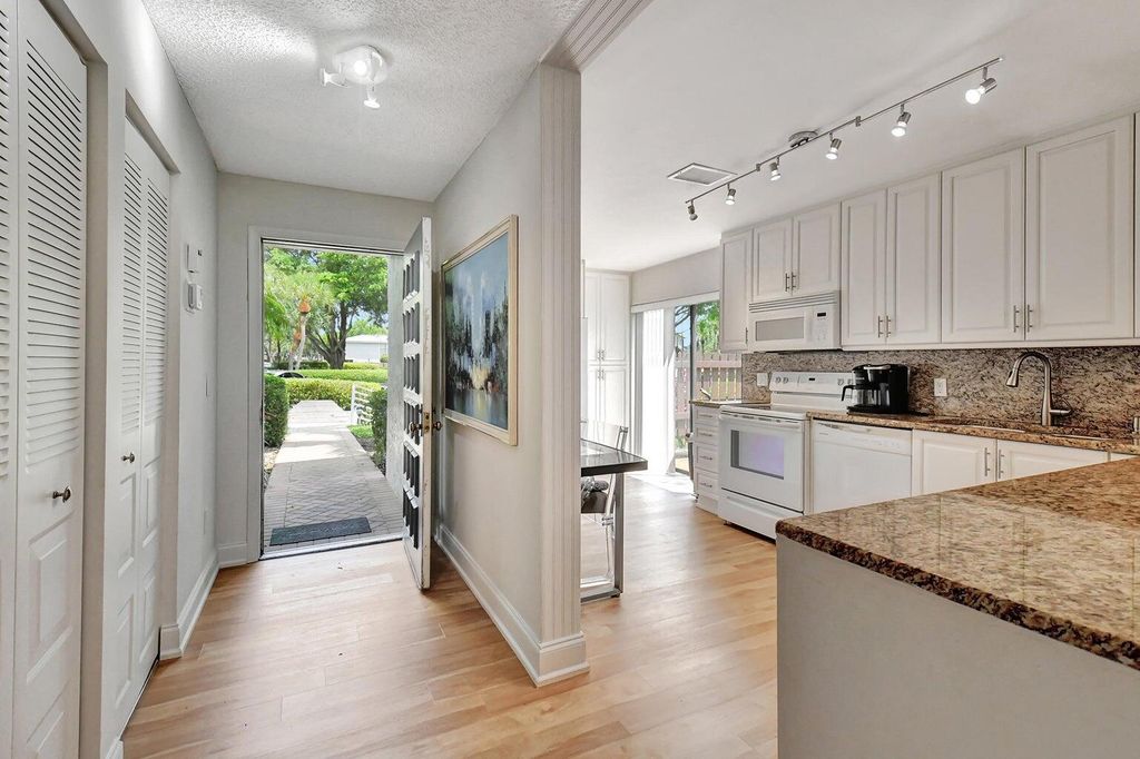 Photo of 11 Southport Lane #A, Boynton Beach, FL 33436 (MLS # R11022639)