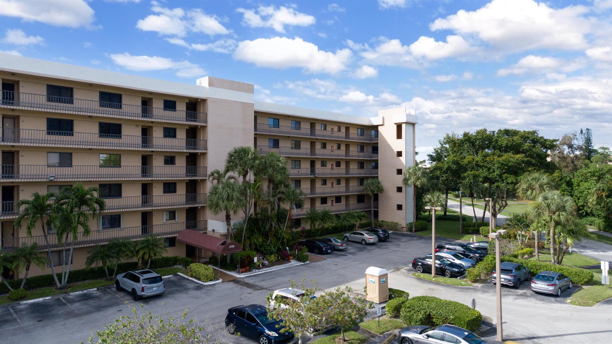 MOVE-IN READY! furnished! Beautifully maintained 2 bed, 2 bath corner unit new flooring in the desirable Lucerne Lakes community of Lake Worth. This spacious condo features an eat-in kitchen with a pass-through to the dining area, an extended living room perfect for entertaining, and an enclosed Florida room with serene water views. The split-bedroom layout offers privacy, with a generous primary suite that includes a walk-in closet, separate vanity area, and more water canal views. Additional features include full-size washer & dryer, an elevator in the building, and the unit is just steps from the pool and clubhouse. Lucerne Lakes is an active 55+ community with amenities including a theater, library, billiards, bingo, fitness center, shuffleboard, and a courtesy bus.
