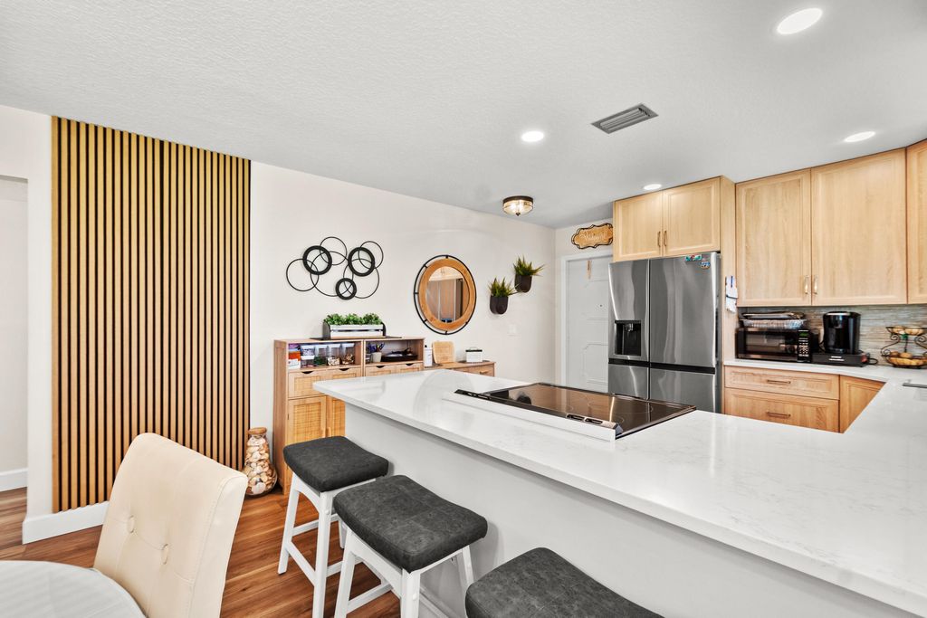 Photo of 61 Woodland Drive #107, Vero Beach, FL 32962 (MLS # B26032041)