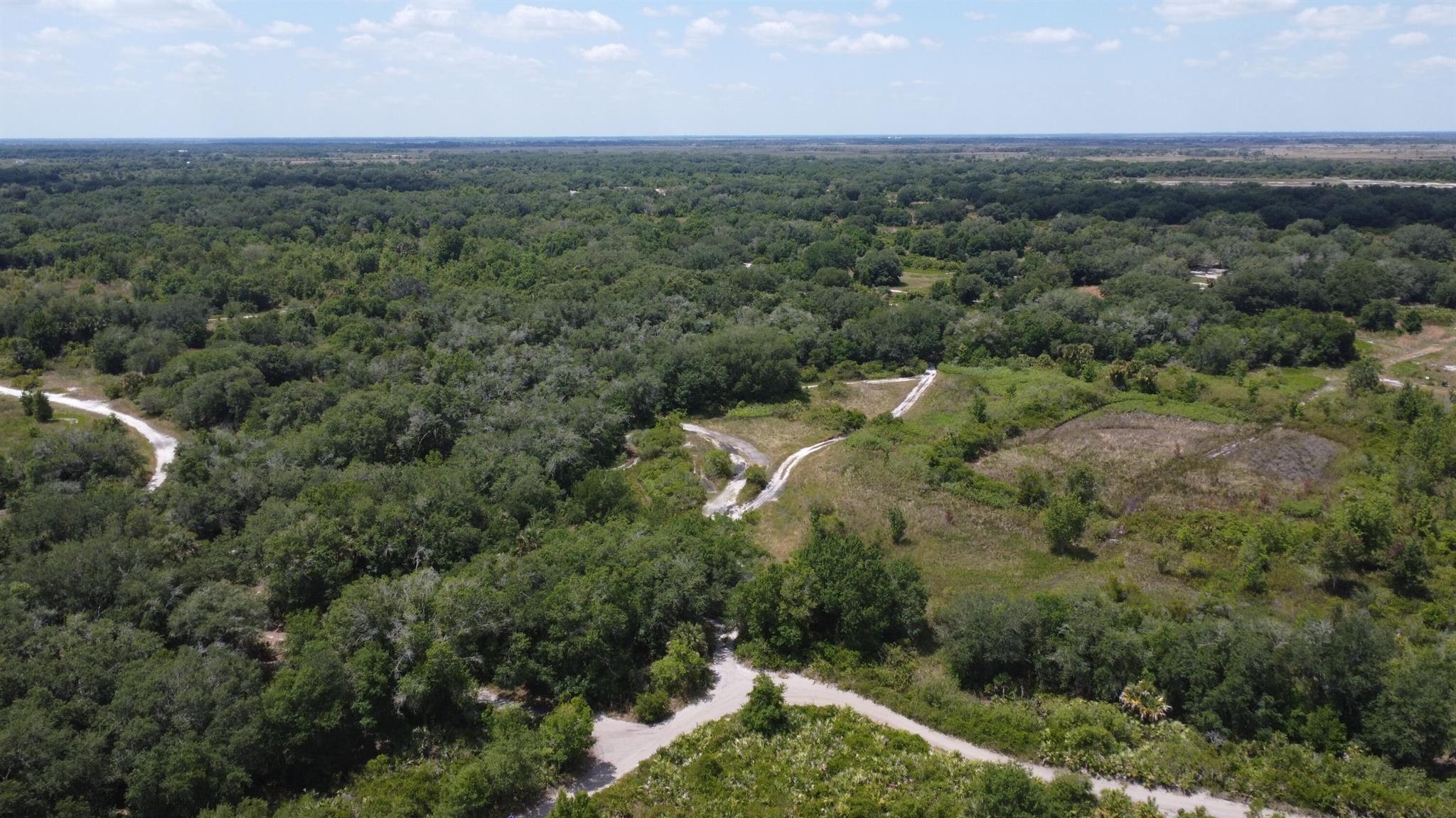 Own 2.5 acres of peaceful, off-grid land in Okeechobee’s Viking Estates. Zoned Agricultural, this raw parcel is perfect for recreational use, outdoor enjoyment, or long-term investment. No HOA, no building requirements, and wide-open skies offer natural privacy and freedom. Accessible via dirt road; electricity nearby—off-grid setup required. Buyer to verify zoning, land use, and access with Okeechobee County.