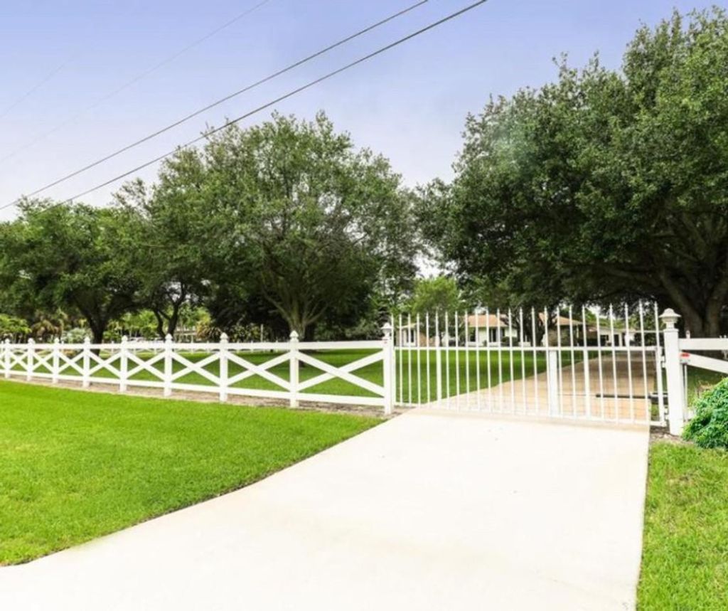 Photo of 8265 S Virginia Avenue, Palm Beach Gardens, FL 33418 (MLS # F10454853)