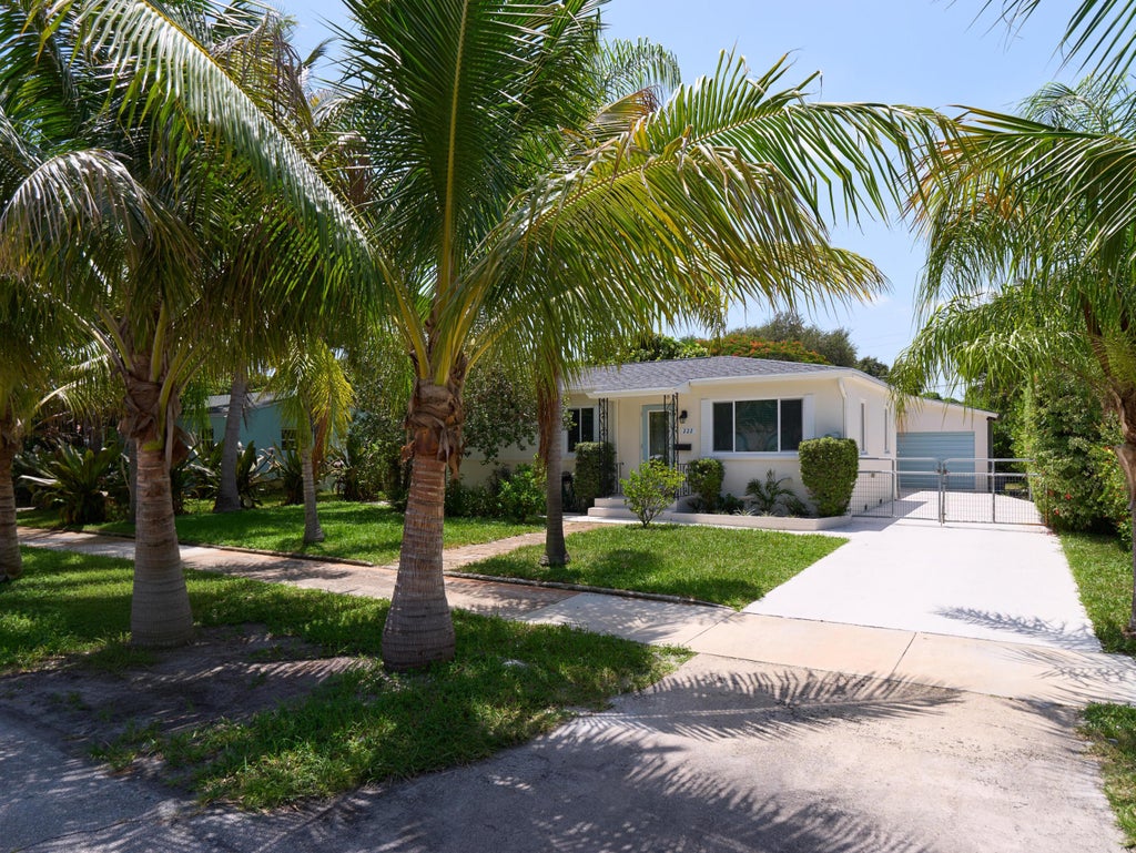 Photo of 222 Bayberry Drive, Lake Park, FL 33403 (MLS # B26066352)