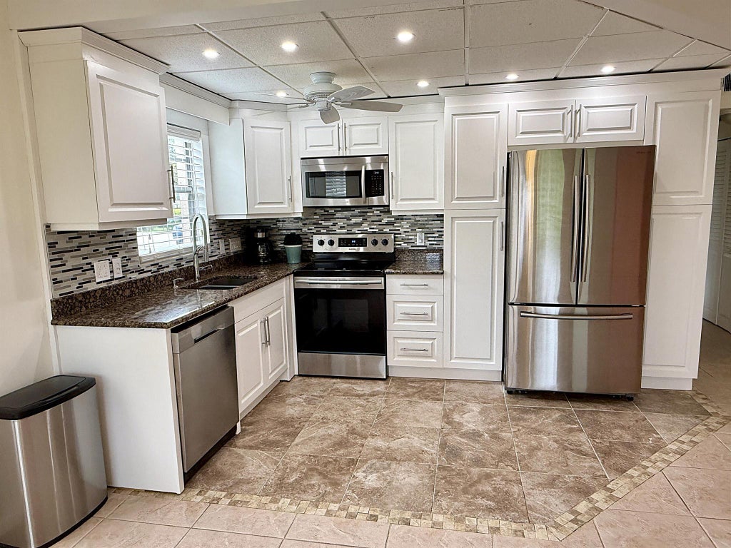 Photo of 53 Upminster C, Deerfield Beach, FL 33442 (MLS # R11126515)