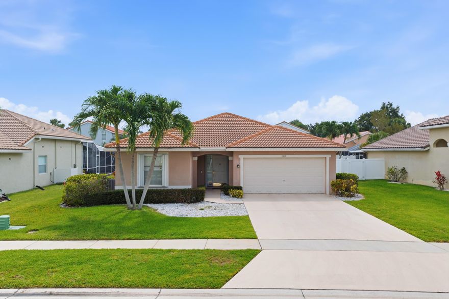 Located in the gated community of Winston Trails, this spacious 3-bedroom, 2-bath CBS home features a desirable split-bedroom floorplan with soaring vaulted ceilings, abundant natural light, and generous living and family room spaces perfect for entertaining. The oversized primary suite offers a walk-in closet and a spa-like bath with a Roman soaking tub. Accordion shutters provide added storm protection and peace of mind. With timeless design and endless potential to personalize, this home is a wonderful opportunity in one of Lake Worth's most sought-after communities. Winston Trails offers resort-style amenities including a public golf course, heated Olympic-size pool, tennis, pickleball, walking trails, kid's playground area, and manned gated entry.
