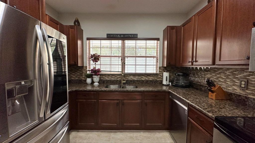 Photo of 4702 Cohune Palm Court, Greenacres, FL 33463 (MLS # R11115131)