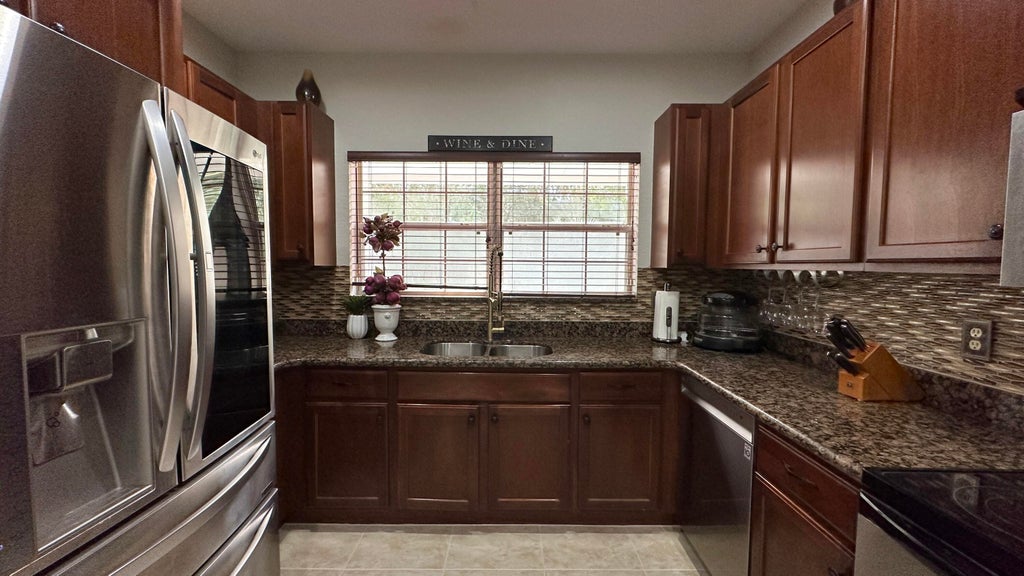 Photo of 4702 Cohune Palm Court, Greenacres, FL 33463 (MLS # R11115131)