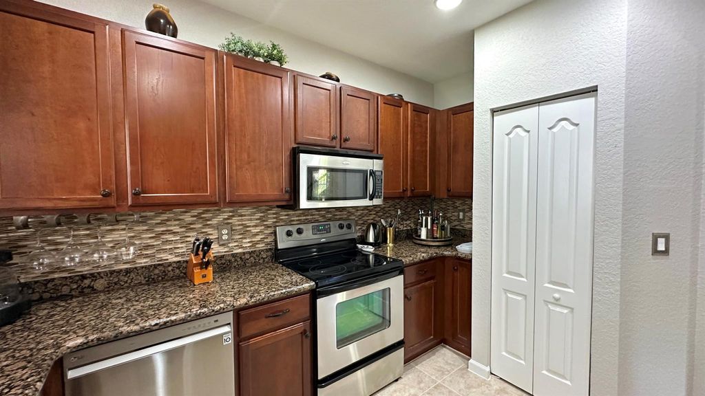 Photo of 4702 Cohune Palm Court, Greenacres, FL 33463 (MLS # R11115131)