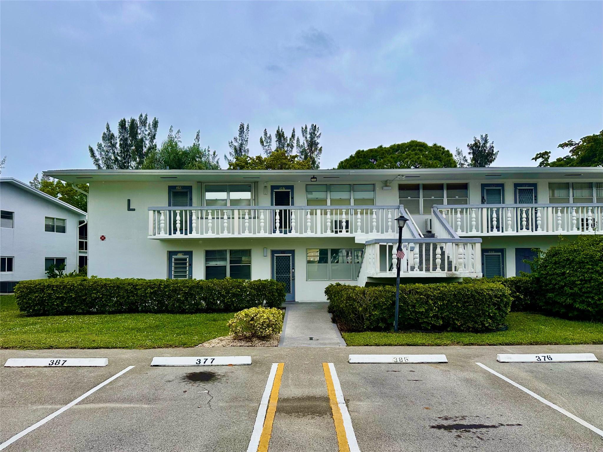 Beatutiful, Bright, and Spacious 1st Floor Corner Unit with Lush Garden and Waterviews. This Condo Features Tile Floors Throughout, Fresh Paint, Smooth Ceilings, Ceiling Fans with Remote Controls, Additinal Windows, Updated Bathrooms, Screened Porch Overlooking The Canal and Graden, Central Air Conditioning, and More. Located in Century Village, an Active 55+ Gated Community with all the ammenities of a Country Club including, Clubhouse, Tennis, Billiards, Heated Pool. Gym, Theater, Arts and crafts, Cafe, Jogging Trail, Bus Shuttle Service, and Much more. This bulding allows rentals from day 1 -No Restrctions. Seller will give a Credit toward a New Refrigerator.