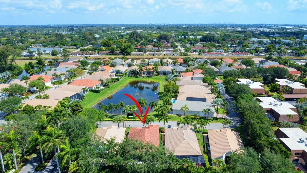 Photo of 104 Palm Circle, Atlantis, FL 33462 (MLS # R11084597)