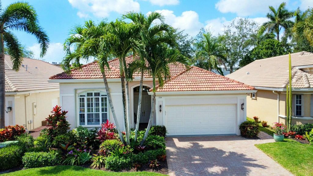 Photo of 104 Palm Circle, Atlantis, FL 33462 (MLS # R11084597)