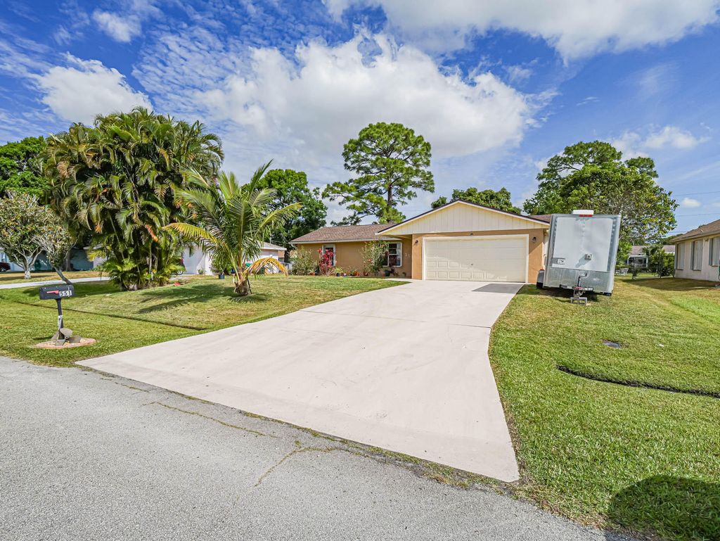 Photo of 551 SW Butler Avenue, Port Saint Lucie, FL 34983 (MLS # R10979587)